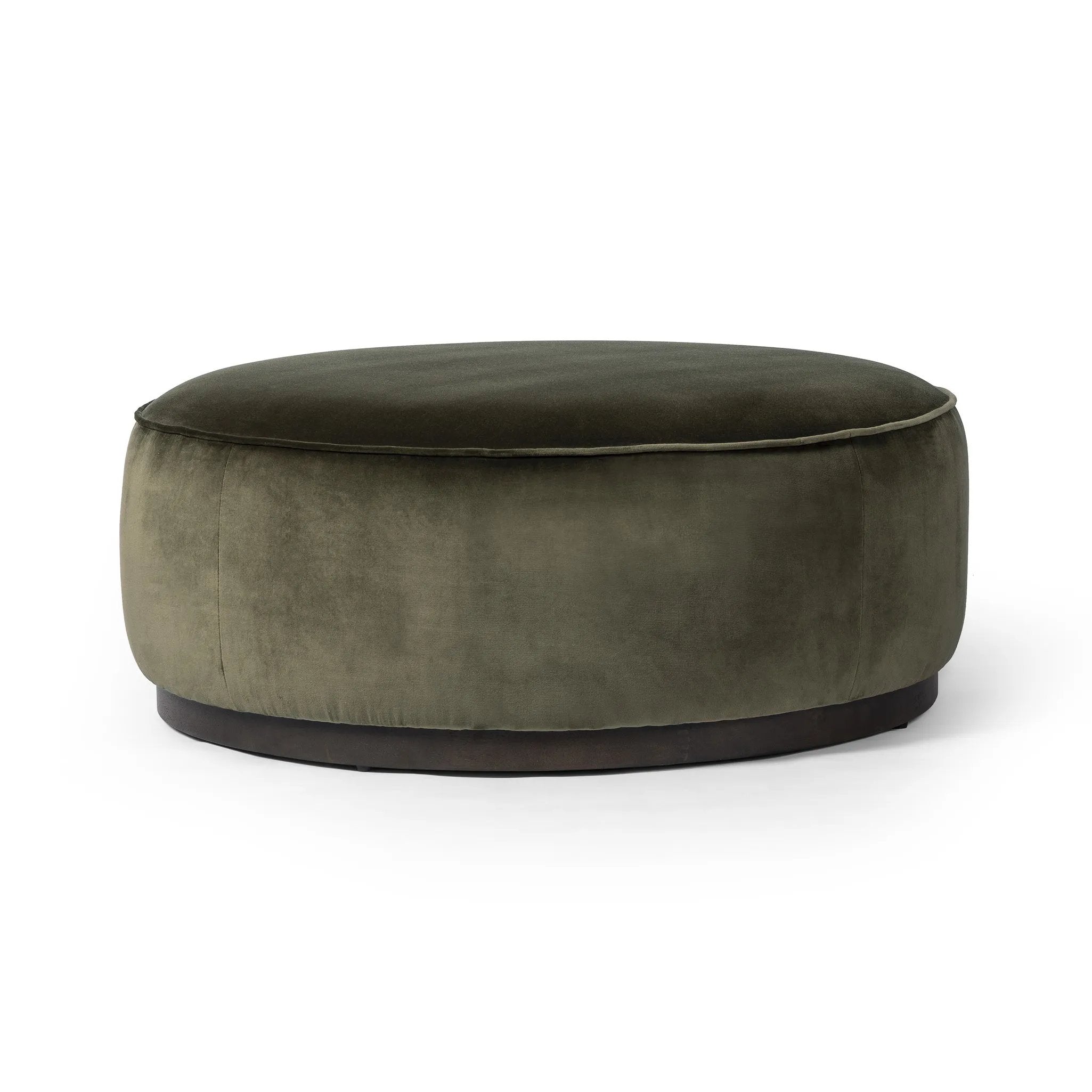 Upholstered in a deep olive velvet and paired with a  rich brown base, this wide, round ottoman can be placed just about anywhere – bringing with it a luxe vibe. Style with a tray as a design-forward coffee table Amethyst Home provides interior design, new home construction design consulting, vintage area rugs, and lighting in the Laguna Beach metro area.