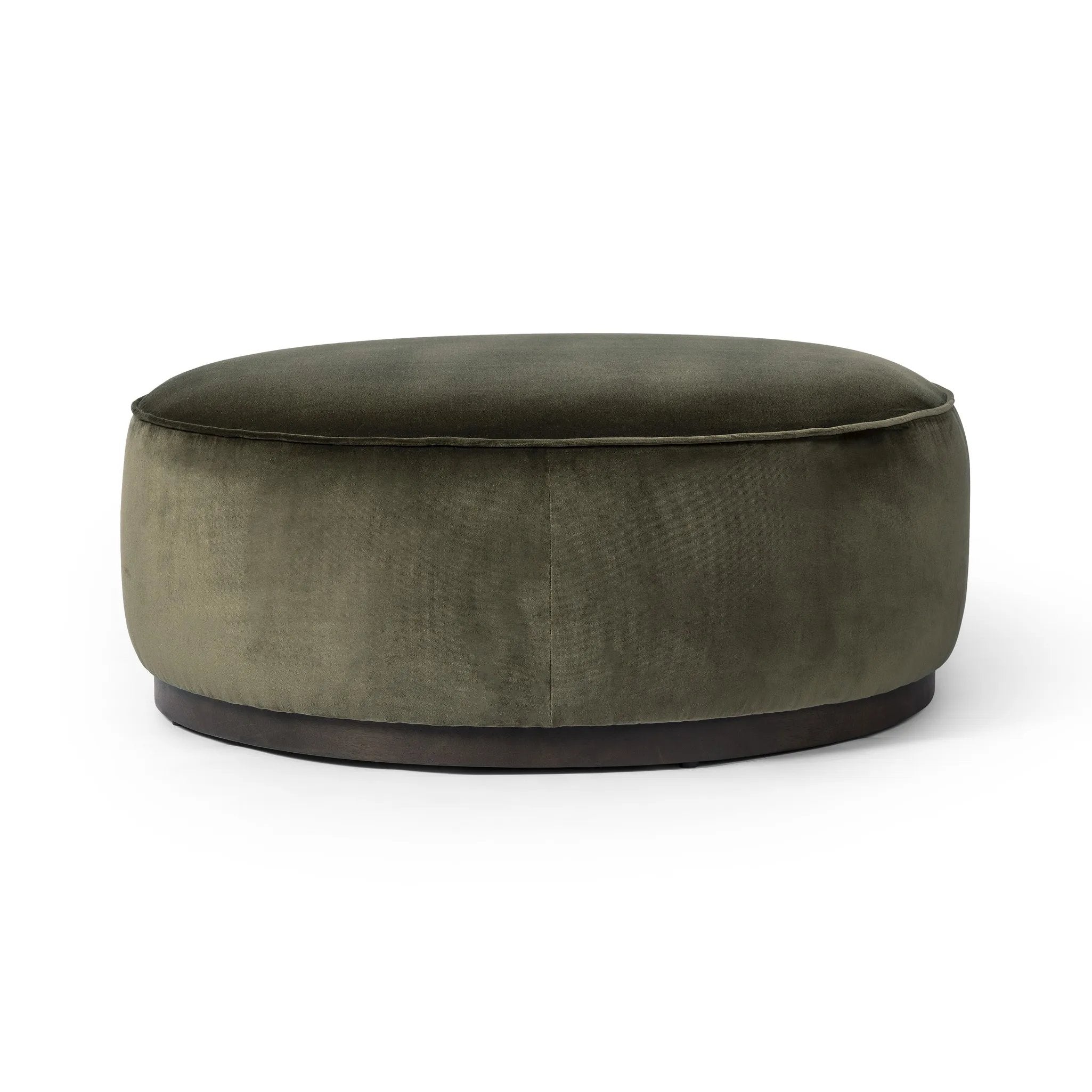 Upholstered in a deep olive velvet and paired with a  rich brown base, this wide, round ottoman can be placed just about anywhere – bringing with it a luxe vibe. Style with a tray as a design-forward coffee table Amethyst Home provides interior design, new home construction design consulting, vintage area rugs, and lighting in the Seattle metro area.
