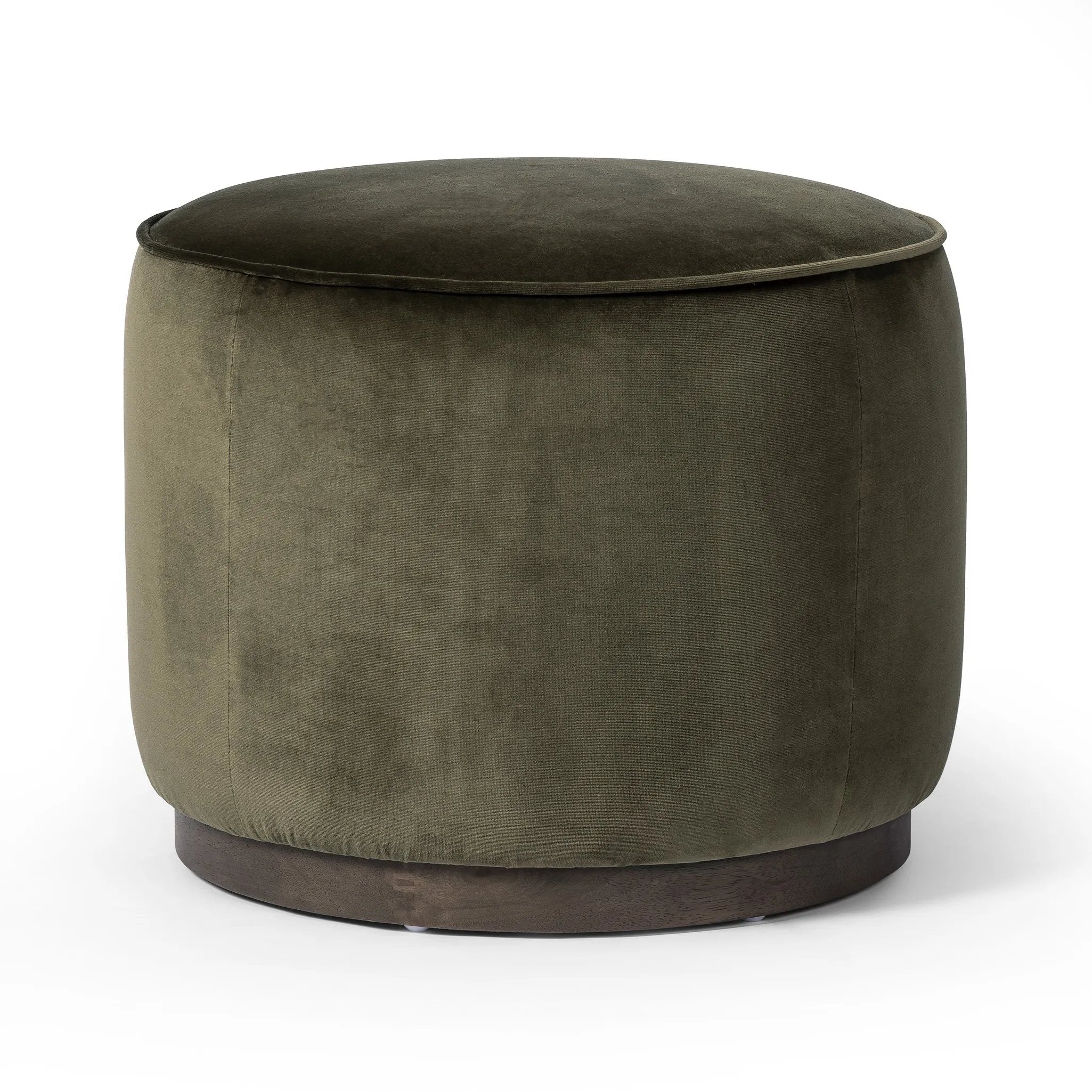 Upholstered in a deep olive velvet and paired with a rich brown base, this rounded ottoman can be placed just about anywhere. Light, versatile color can move between spaces and style with ease Amethyst Home provides interior design, new home construction design consulting, vintage area rugs, and lighting in the Houston metro area.