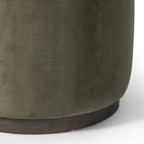 Upholstered in a deep olive velvet and paired with a rich brown base, this rounded ottoman can be placed just about anywhere. Light, versatile color can move between spaces and style with ease Amethyst Home provides interior design, new home construction design consulting, vintage area rugs, and lighting in the Laguna Beach metro area.