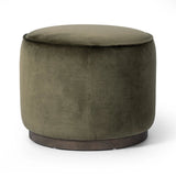 Upholstered in a deep olive velvet and paired with a rich brown base, this rounded ottoman can be placed just about anywhere. Light, versatile color can move between spaces and style with ease Amethyst Home provides interior design, new home construction design consulting, vintage area rugs, and lighting in the Scottsdale metro area.