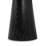 Mixed materials make for great drama. A cone-tapered base of dark oak supports a rounded tabletop of solid bluestone, with oak banding on the edges for thoughtful contrast Amethyst Home provides interior design, new home construction design consulting, vintage area rugs, and lighting in the San Diego metro area.