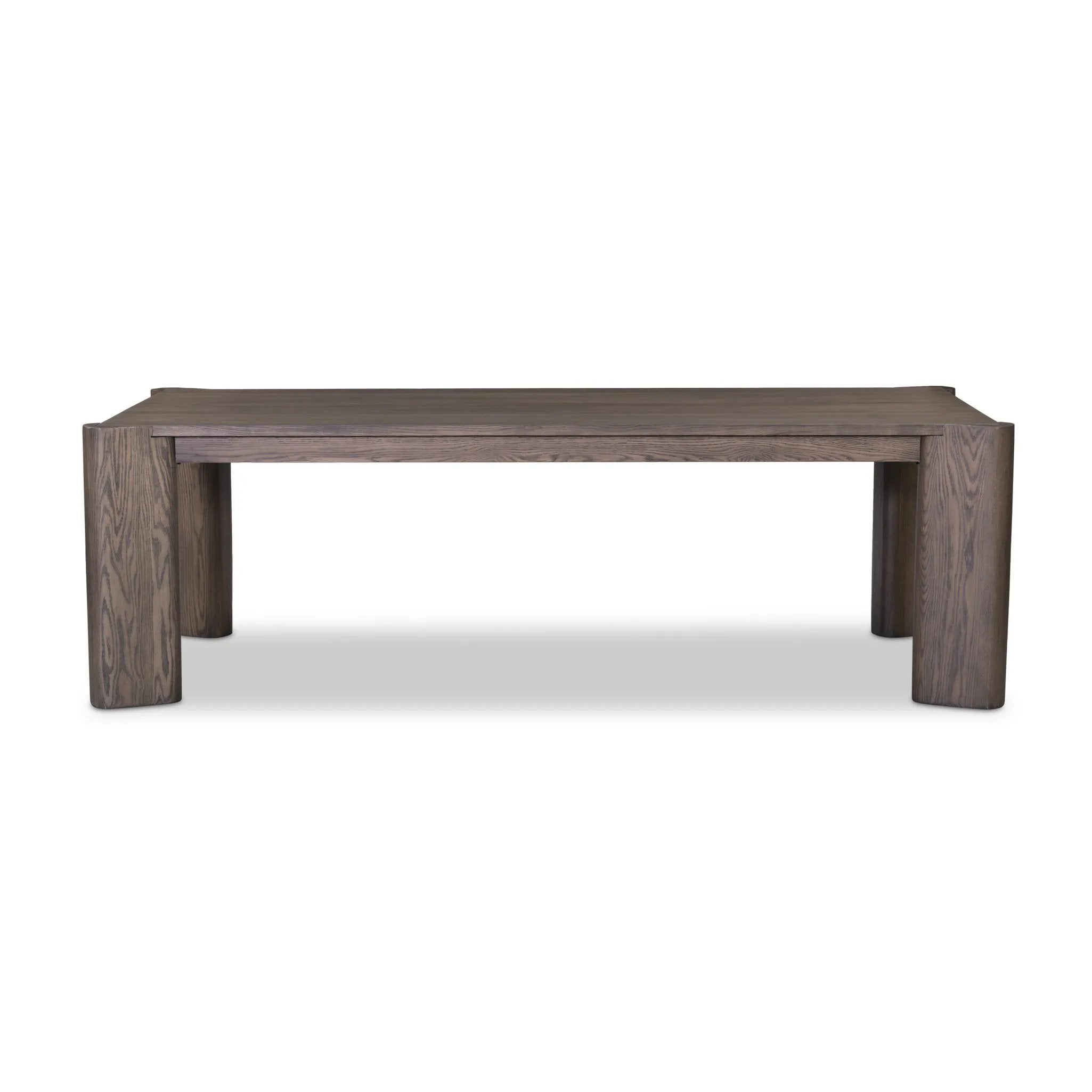 A Parsons-style dining table is defined by heavy proportions and angled, over-scaled legs. Crafted from reclaimed wood and finished with an aged natural oak stain to showcase natural cracks and patches for added character Amethyst Home provides interior design, new home construction design consulting, vintage area rugs, and lighting in the Alpharetta metro area.