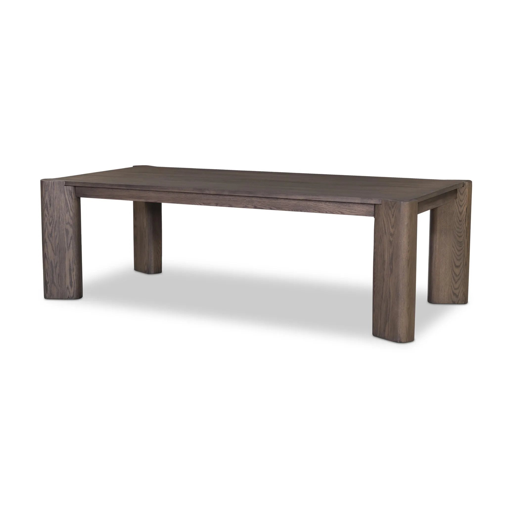 A Parsons-style dining table is defined by heavy proportions and angled, over-scaled legs. Crafted from reclaimed wood and finished with an aged natural oak stain to showcase natural cracks and patches for added character Amethyst Home provides interior design, new home construction design consulting, vintage area rugs, and lighting in the Calabasas metro area.