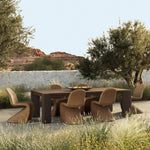 This Parsons-style outdoor dining table is defined by heavy proportions and over-scaled angled legs. Crafted from reclaimed wood and finished with a heritage brown stain to showcase natural cracks and patches for added character. Cover or store indoors during inclement weather and when not in use Amethyst Home provides interior design, new home construction design consulting, vintage area rugs, and lighting in the Calabasas metro area.