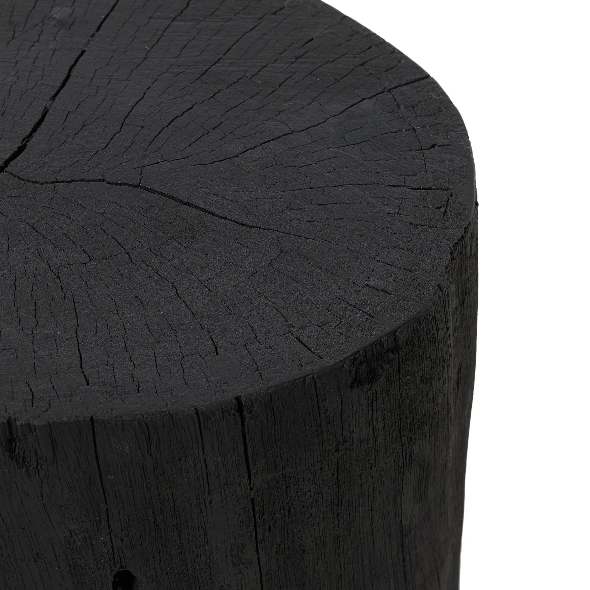 Ground any room with a style inspired by the beautiful simplicity of nature. Made of black-finished resin, the form for this special piece is molded from a tree trunk, then cast in resin to recreate the same shape and texture of the trunk — talk about a true statement piece Amethyst Home provides interior design, new home construction design consulting, vintage area rugs, and lighting in the Salt Lake City metro area.