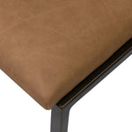 Bring a slim, light look to the dining room. This counter stool pairs camel top-grain leather and bronzed iron to craft a simple, airy look. A tapered leg and decorative handle on the back elevate the look.As fans of organic modern materials at Amethyst, we love the optimistic inspired Somerson Stool - Counter. Amethyst Home provides interior design, new home construction design consulting, vintage area rugs, and lighting in the Salt Lake City metro area.
