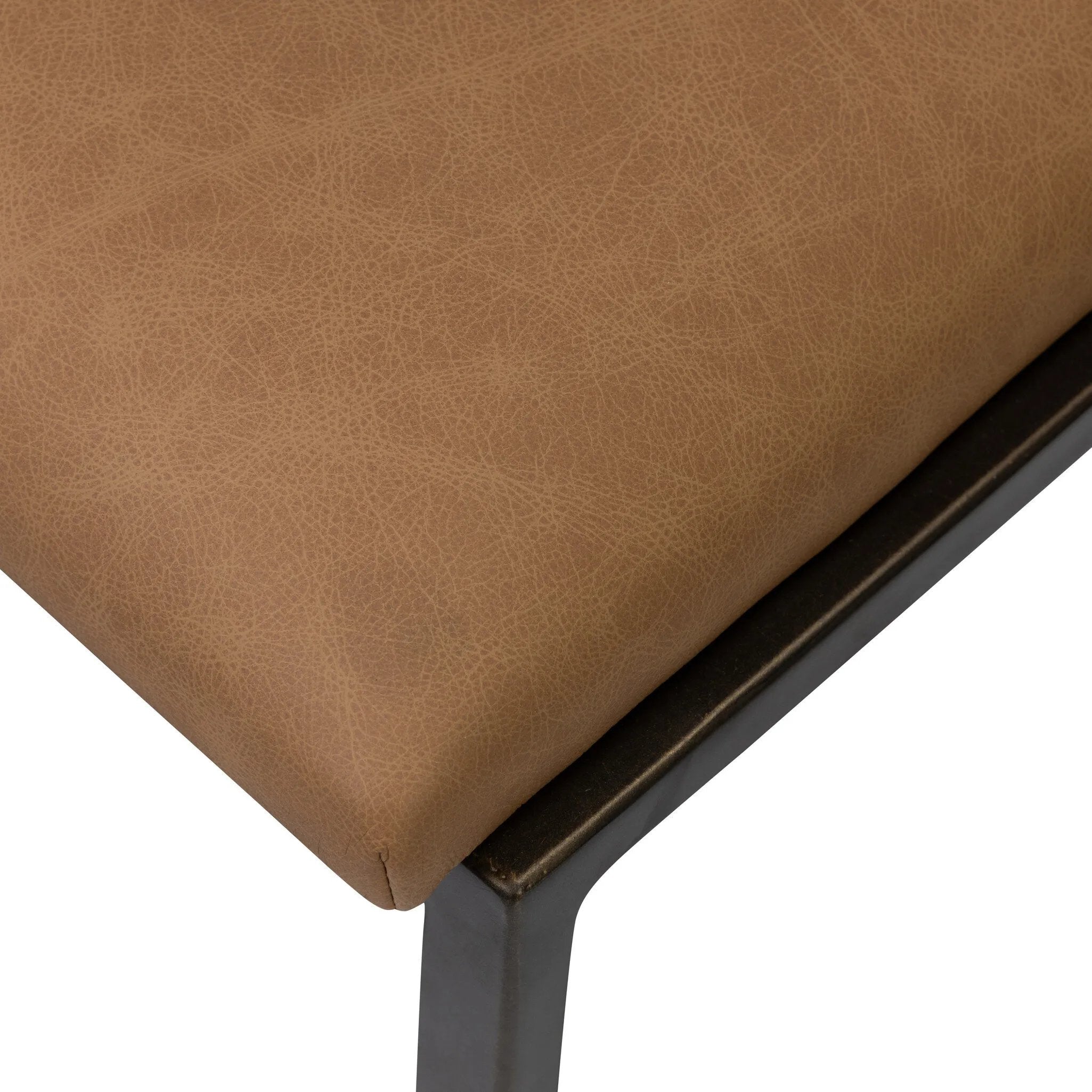 Bring a slim, light look to the dining room. This counter stool pairs camel top-grain leather and bronzed iron to craft a simple, airy look. A tapered leg and decorative handle on the back elevate the look.As fans of organic modern materials at Amethyst, we love the optimistic inspired Somerson Stool - Counter. Amethyst Home provides interior design, new home construction design consulting, vintage area rugs, and lighting in the Salt Lake City metro area.