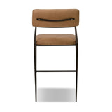Bring a slim, light look to the dining room. This counter stool pairs camel top-grain leather and bronzed iron to craft a simple, airy look. A tapered leg and decorative handle on the back elevate the look.As fans of organic modern materials at Amethyst, we love the optimistic inspired Somerson Stool - Counter. Amethyst Home provides interior design, new home construction design consulting, vintage area rugs, and lighting in the Winter Garden metro area.