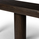 Three round pillar legs support a thick oval top featuring rounded edges. A dark brown pine finish showcases rich grain movement, playing up the curvature of this piece.Collection: Westgat Amethyst Home provides interior design, new home construction design consulting, vintage area rugs, and lighting in the Charlotte metro area.