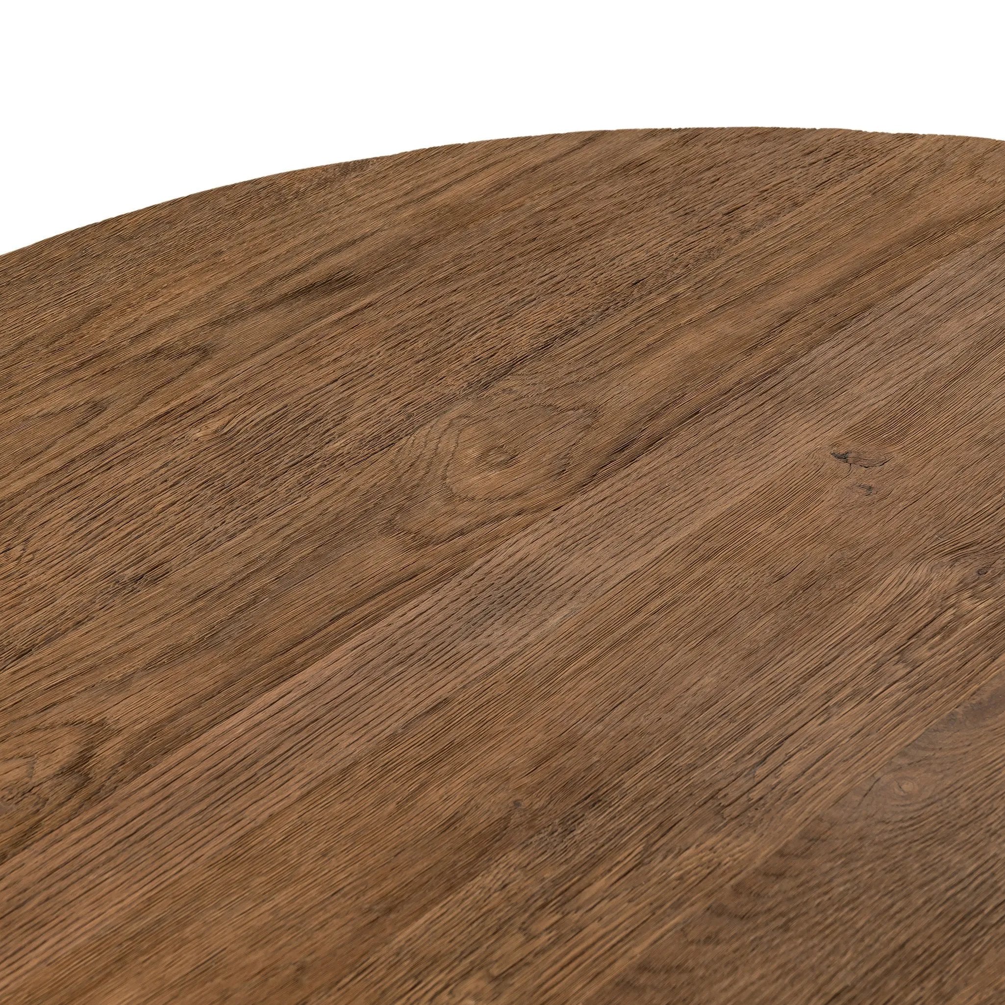 Made from character-rich resawn oak, a simple, rounded coffee table features splayed legs for a low, angular look Amethyst Home provides interior design, new home construction design consulting, vintage area rugs, and lighting in the Alpharetta metro area.