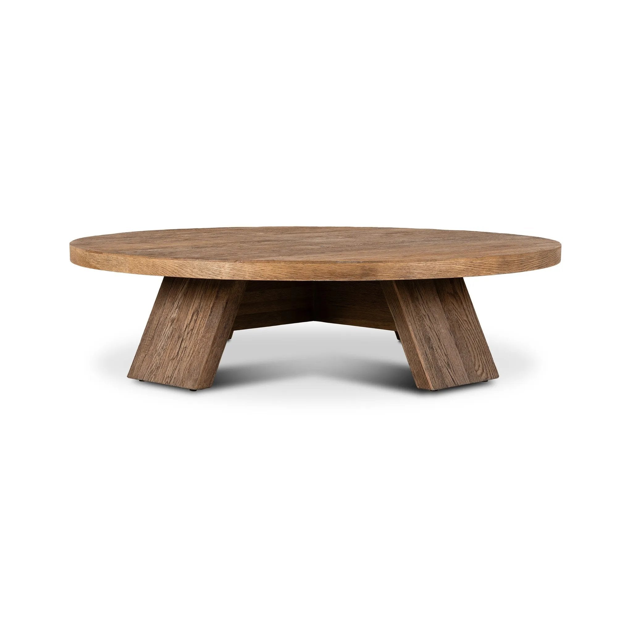 Made from character-rich resawn oak, a simple, rounded coffee table features splayed legs for a low, angular look Amethyst Home provides interior design, new home construction design consulting, vintage area rugs, and lighting in the Calabasas metro area.