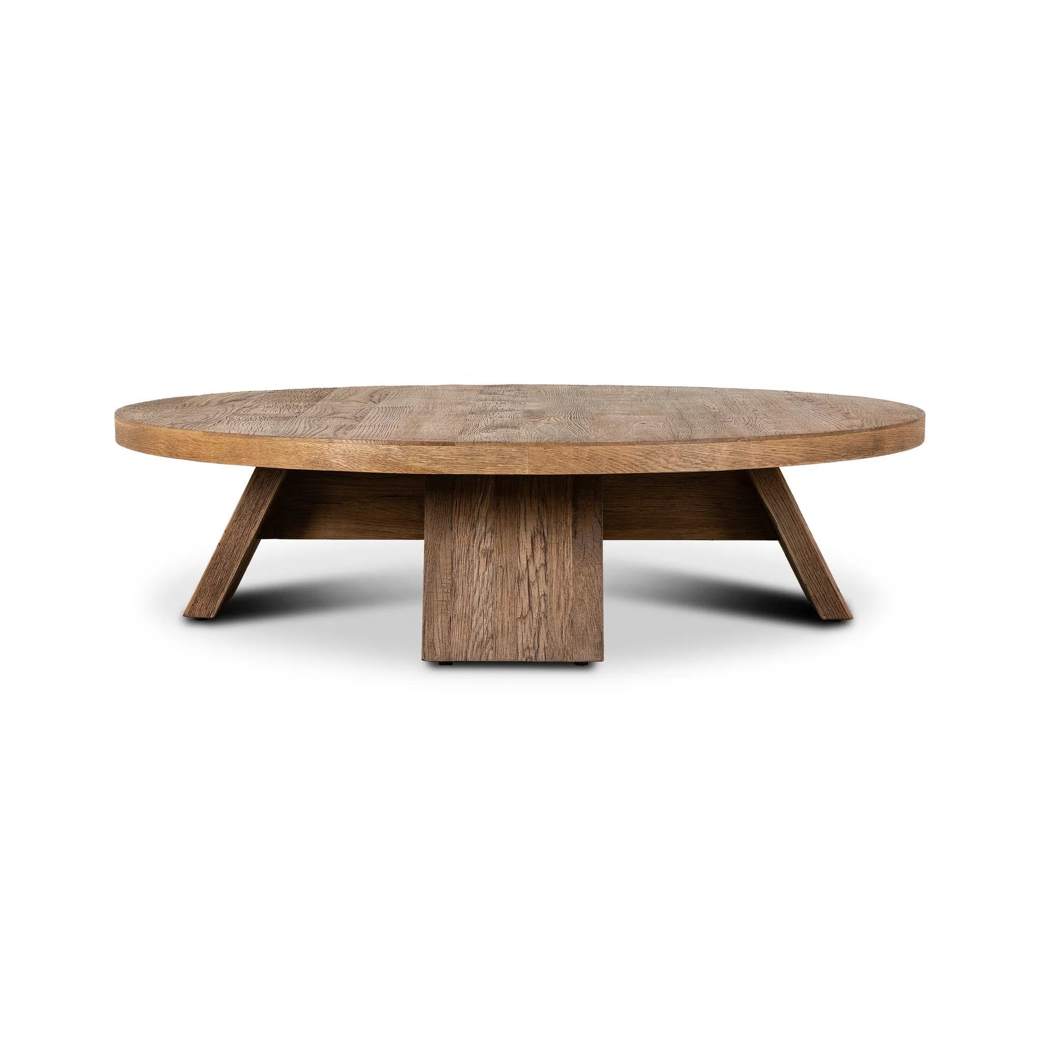 Made from character-rich resawn oak, a simple, rounded coffee table features splayed legs for a low, angular look Amethyst Home provides interior design, new home construction design consulting, vintage area rugs, and lighting in the Los Angeles metro area.