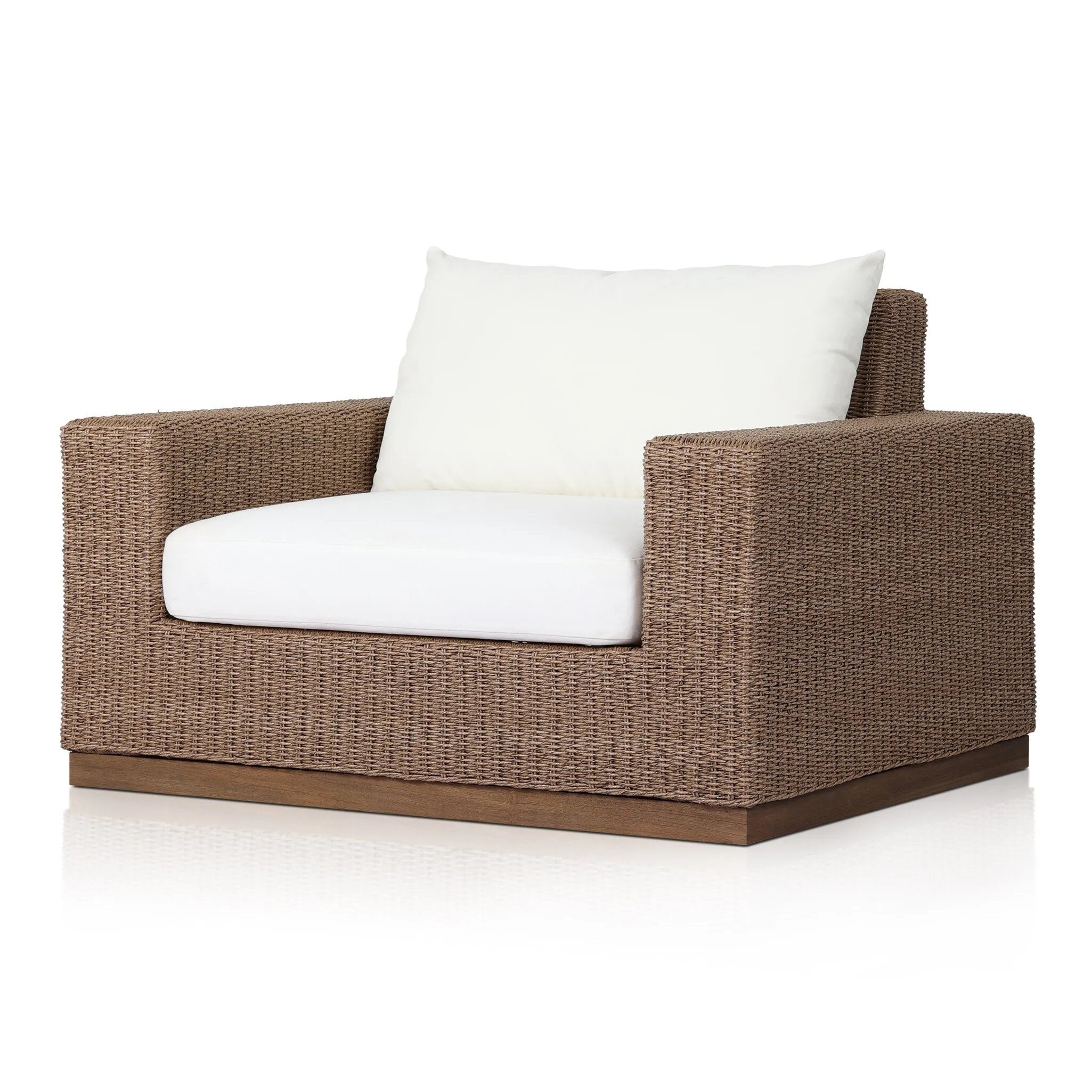Featuring Suri Arashi Salt Outdoor Chair by Four Hands at Amethyst Home. Elevate your outdoors. A wide-format outdoor chair features a faux hyacinth frame and plinth base. Linear details and a boxy silhouette make this piece truly timeless, while a knife-edge back  cushion softens the whole look. Upholstered in 100% olefin, known for its UV-resistant, water. Amethyst Home provides interior design, new home construction design consulting, vintage area rugs, and lighting in the Charlotte metro area.