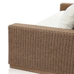 Elevate your outdoors. A wide-format outdoor sofa features a faux hyacinth frame and plinth base. Linear details and a boxy silhouette make this piece truly timeless, while knife-edge back cushions soften the whole look. Upholstered in 100% olefin, known for its UV-resistant, water-repellent and quick-drying abilities. Amethyst Home provides interior design, new home construction design consulting, vintage area rugs, and lighting in the Austin metro area.