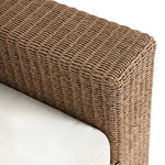 Elevate your outdoors. A wide-format outdoor sofa features a faux hyacinth frame and plinth base. Linear details and a boxy silhouette make this piece truly timeless, while knife-edge back cushions soften the whole look. Upholstered in 100% olefin, known for its UV-resistant, water-repellent and quick-drying abilities. Amethyst Home provides interior design, new home construction design consulting, vintage area rugs, and lighting in the Miami metro area.