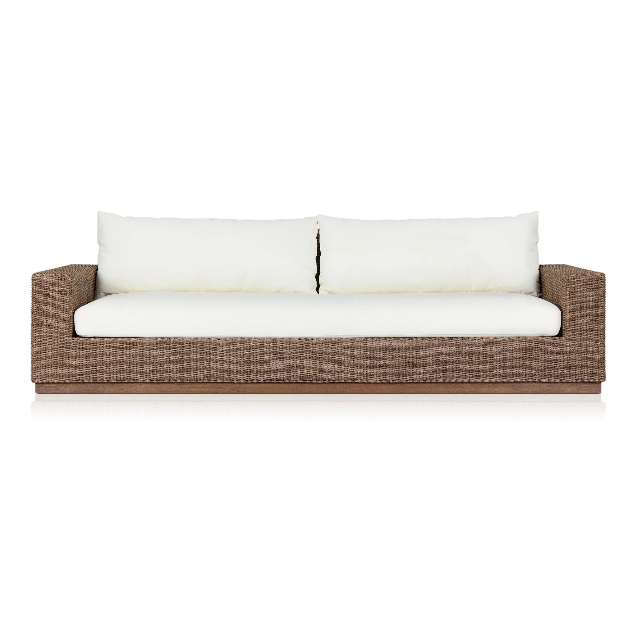 Elevate your outdoors. A wide-format outdoor sofa features a faux hyacinth frame and plinth base. Linear details and a boxy silhouette make this piece truly timeless, while knife-edge back cushions soften the whole look. Upholstered in 100% olefin, known for its UV-resistant, water-repellent and quick-drying abilities. Amethyst Home provides interior design, new home construction design consulting, vintage area rugs, and lighting in the Park City metro area.