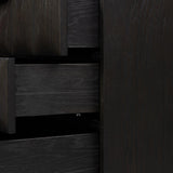 A softened Brutalist take on the traditional nightstand. The monolithic piece’s black oak veneer case sits atop a matching pedestal for an element of exaggeration. A grid pattern with inflated volume adds drama.As enthusiasts of luxe materials at Amethyst, we love the warm modern inspired Swell Nightstand - Dry Black Oak Veneer. Amethyst Home provides interior design, new home construction design consulting, vintage area rugs, and lighting in the Los Angeles metro area.