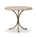 Hammered aged brass forms a tulip-shaped base with ball details for a design-forward touch. Bullnose edges on a rounded fossil marble tabletop soften the whole look Amethyst Home provides interior design, new home construction design consulting, vintage area rugs, and lighting in the Miami metro area.