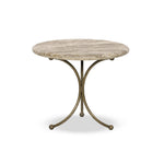 Hammered aged brass forms a tulip-shaped base with ball details for a design-forward touch. Bullnose edges on a rounded fossil marble tabletop soften the whole look Amethyst Home provides interior design, new home construction design consulting, vintage area rugs, and lighting in the Portland metro area.