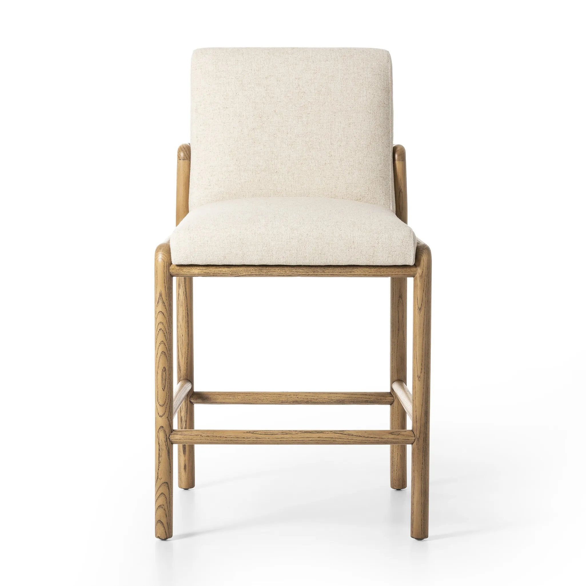 A fluid nettlewood frame cradles a comfortable cushion in a high-performance linen blend. At the back of the chair, a fabric covered handle adds architectural interest to a seamless form. Perfectly sized for the counter. Amethyst Home provides interior design, new home construction design consulting, vintage area rugs, and lighting in the Winter Garden metro area.