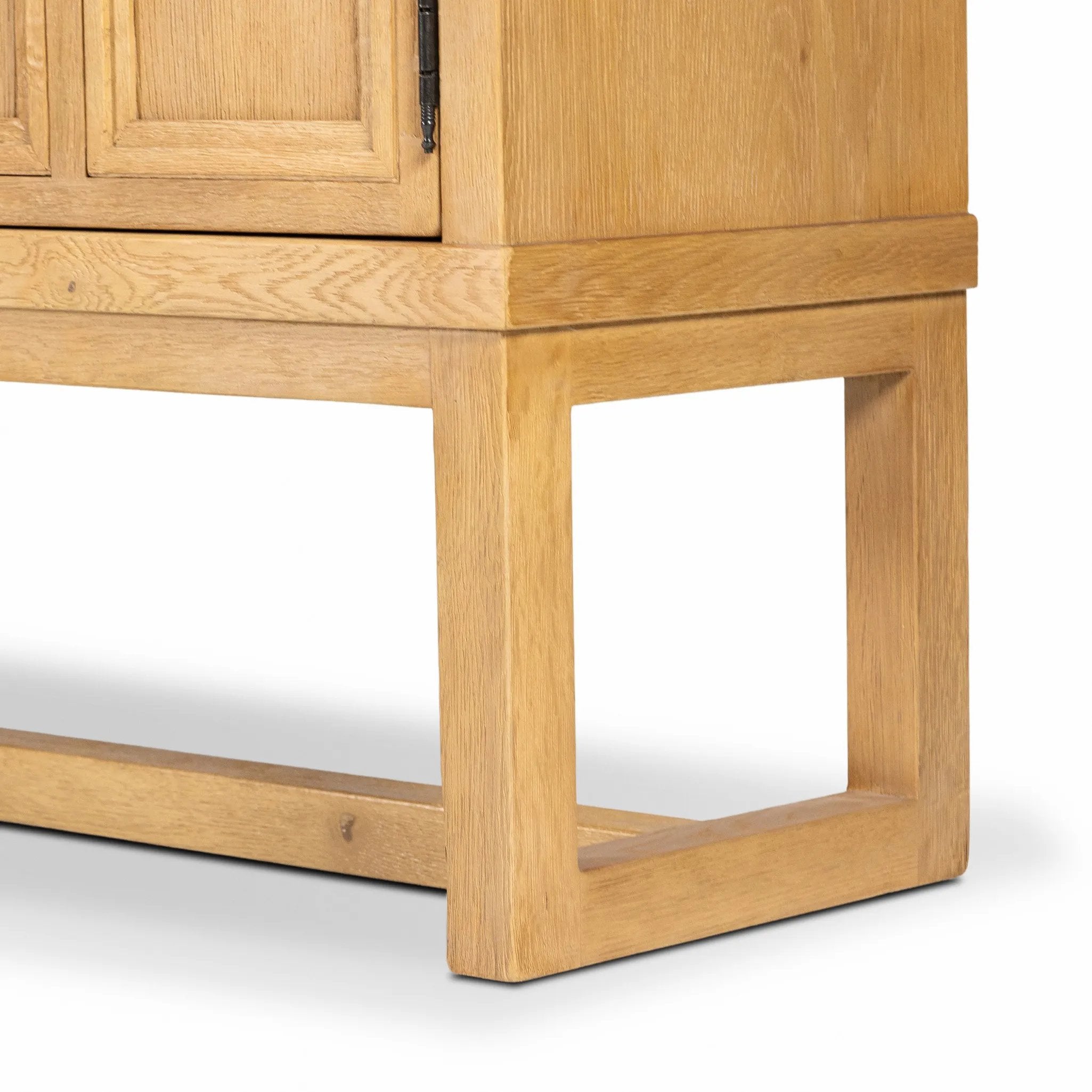 Worn oak sideboard with paneled doors, all atop an elevated stand. With natural cracks for character, this piece brings bonus storage and vintage charm to dining spaces Amethyst Home provides interior design, new home construction design consulting, vintage area rugs, and lighting in the Park City metro area.