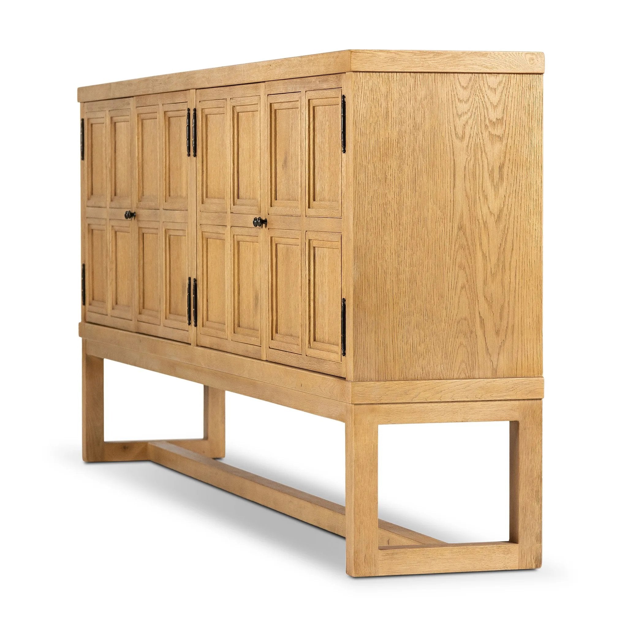 Worn oak sideboard with paneled doors, all atop an elevated stand. With natural cracks for character, this piece brings bonus storage and vintage charm to dining spaces Amethyst Home provides interior design, new home construction design consulting, vintage area rugs, and lighting in the Winter Garden metro area.