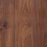 Design your space with hallmark features inspired by soft Brutalism. Made from solid walnut and poplar woods with a natural finish, the cabinet is topped with a black marble top with half bullnose edging for smooth contours. Double doors open to two shelves for ample storage. High-quality hardware is crafted from black iron. Amethyst Home provides interior design, new home construction design consulting, vintage area rugs, and lighting in the Scottsdale metro area.