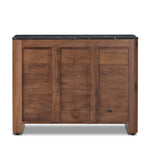 Design your space with hallmark features inspired by soft Brutalism. Made from solid walnut and poplar woods with a natural finish, the cabinet is topped with a black marble top with half bullnose edging for smooth contours. Double doors open to two shelves for ample storage. High-quality hardware is crafted from black iron. Amethyst Home provides interior design, new home construction design consulting, vintage area rugs, and lighting in the Seattle metro area.