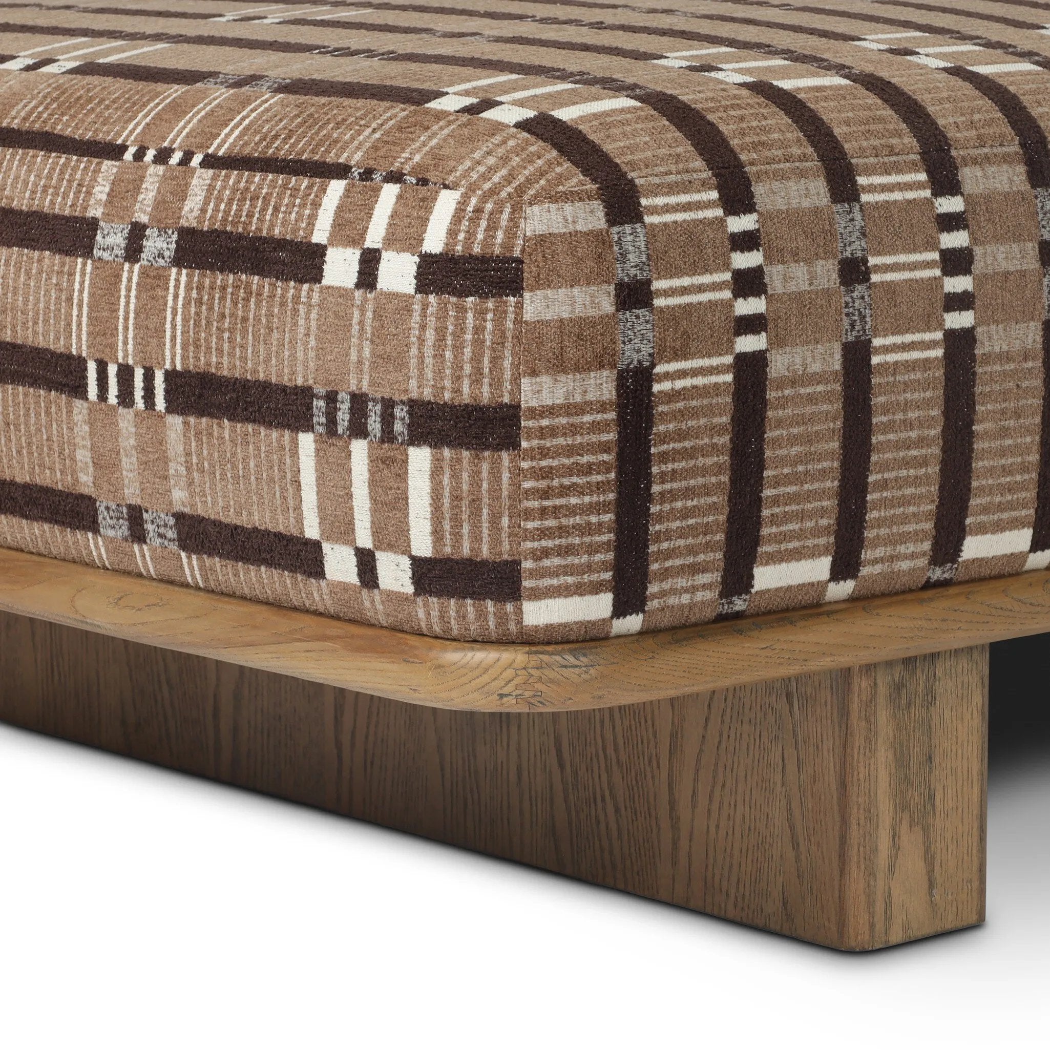 Taking inspiration from vintage Swedish textiles, this chaise serves double duty as an inviting seat and a one-of-a-kind conversation starter. It's a play of geometry and texture, from the sturdy wood frame and bold silhouette to the rich mix of upholstery and cut-in bolster cushion. Amethyst Home provides interior design, new home construction design consulting, vintage area rugs, and lighting in the Tampa metro area.