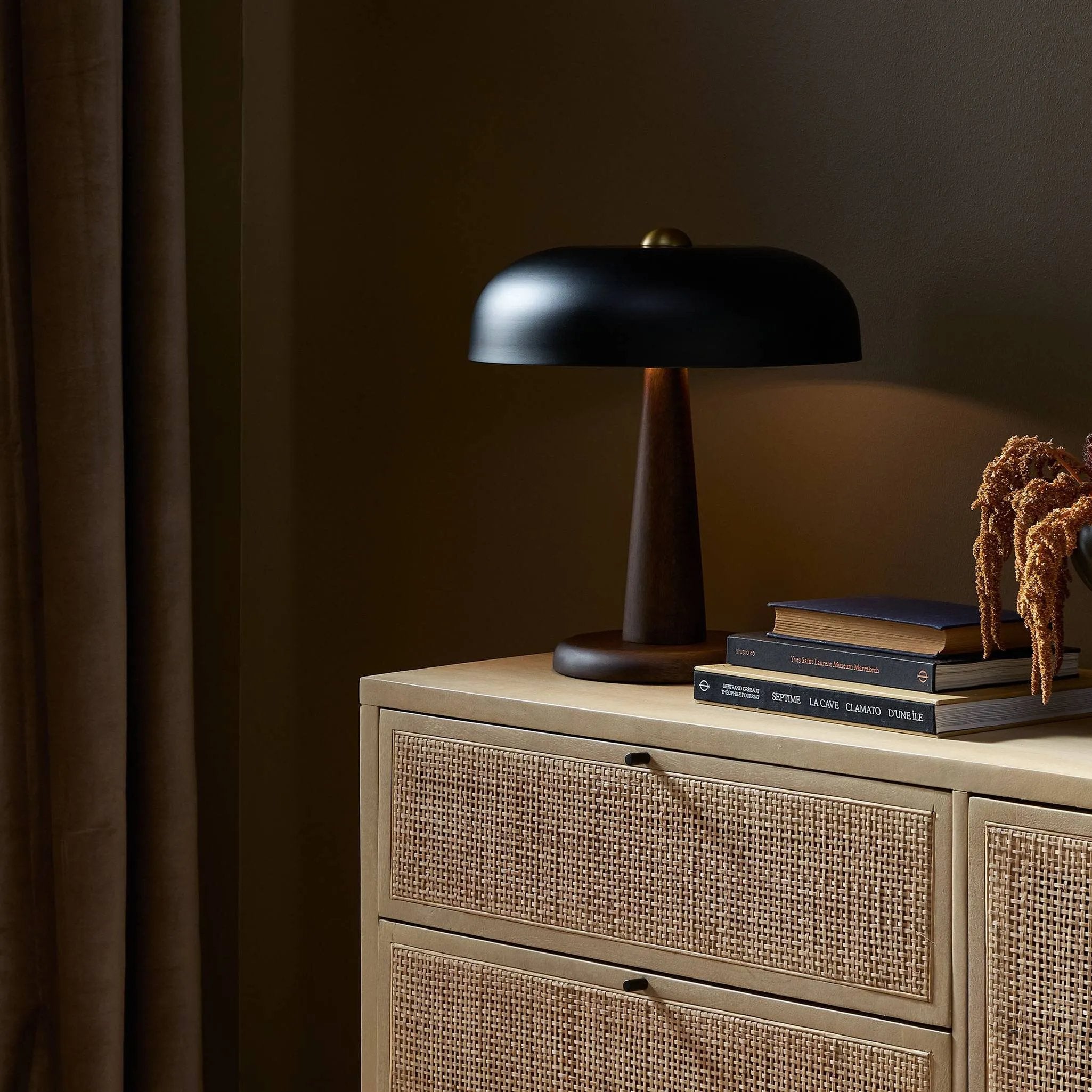 This Seventies-inspired table lamp combines a low, curved metal shade with a classic brass finial and wooden base. Perfect in a home office or on your nightstand as a bedside reading lamp Amethyst Home provides interior design, new home construction design consulting, vintage area rugs, and lighting in the Des Moines metro area.