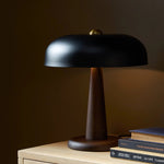 Featuring Tennon Russet Mango Table Lamp by Four Hands at Amethyst Home. This Seventies-inspired table lamp combines a low, curved metal shade with a classic brass finial and wooden base. Perfect in a home office or on your nightstand as a bedside reading lamp. Overall Dimensions: 14.00"w x 14.00"d x 16.00"h. Amethyst Home provides interior design, new home construction design consulting, vintage area rugs, and lighting in the Salt Lake City metro area.