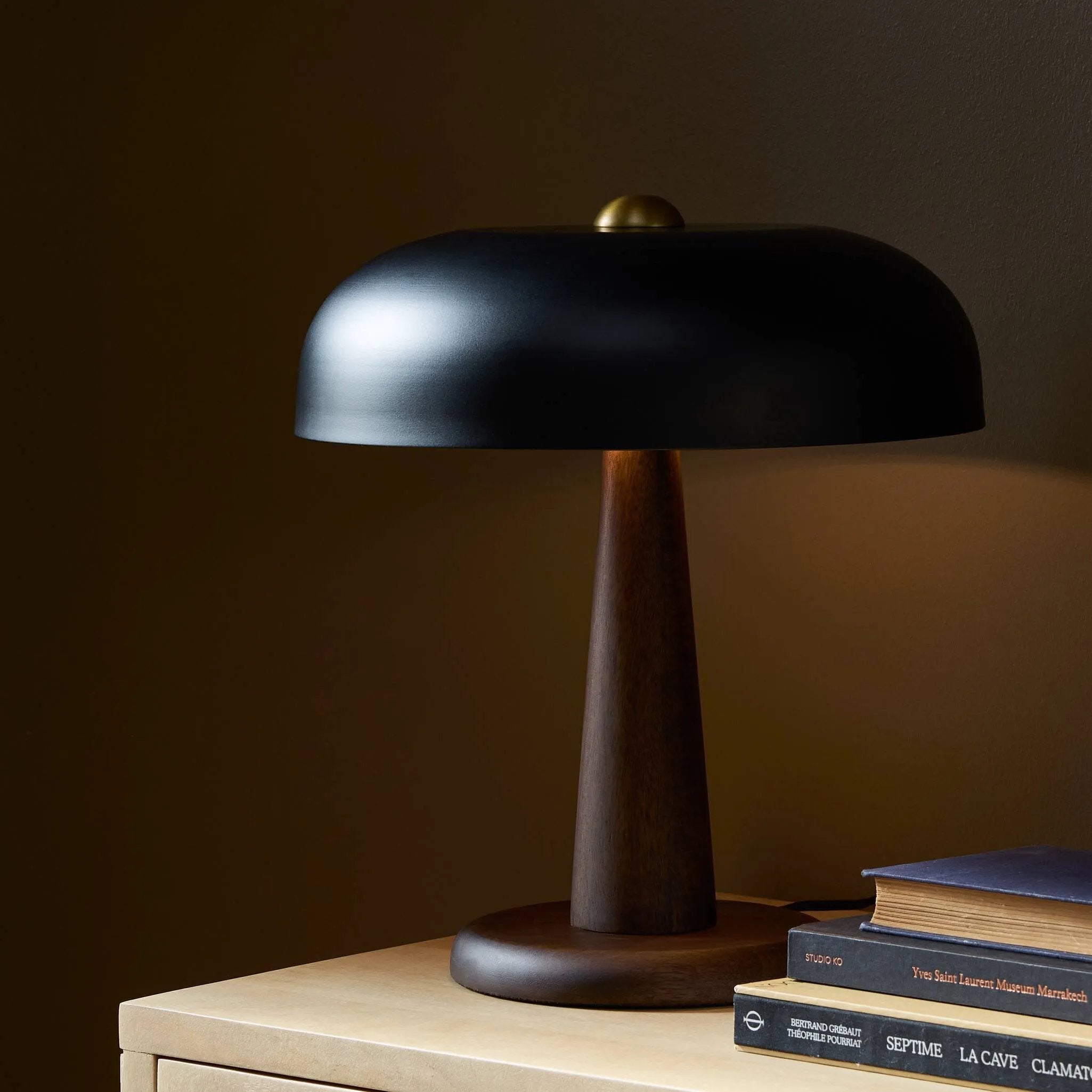 Featuring Tennon Russet Mango Table Lamp by Four Hands at Amethyst Home. This Seventies-inspired table lamp combines a low, curved metal shade with a classic brass finial and wooden base. Perfect in a home office or on your nightstand as a bedside reading lamp. Overall Dimensions: 14.00"w x 14.00"d x 16.00"h. Amethyst Home provides interior design, new home construction design consulting, vintage area rugs, and lighting in the Salt Lake City metro area.