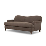The traditional English roll-arm sofa gains refinement. Clean lines replace the fuss, retaining nothing but pure, effortless comfort. The sofa features a graceful reverse camelback and back-turned wooden legs, balanced by pleated arms and an exaggerated, voluminous seat cushion. Generously filled with feathers for added texture and character. Amethyst Home provides interior design, new home construction design consulting, vintage area rugs, and lighting in the Miami metro area.