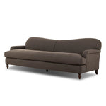The traditional English roll-arm sofa gains refinement. Clean lines replace the fuss, retaining nothing but pure, effortless comfort. The sofa features a graceful reverse camelback and back-turned wooden legs, balanced by pleated arms and an exaggerated, voluminous seat cushion. Generously filled with feathers for added texture and character. Amethyst Home provides interior design, new home construction design consulting, vintage area rugs, and lighting in the Park City metro area.