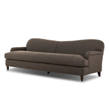 The traditional English roll-arm sofa gains refinement. Clean lines replace the fuss, retaining nothing but pure, effortless comfort. The sofa features a graceful reverse camelback and back-turned wooden legs, balanced by pleated arms and an exaggerated, voluminous seat cushion. Generously filled with feathers for added texture and character. Amethyst Home provides interior design, new home construction design consulting, vintage area rugs, and lighting in the Park City metro area.
