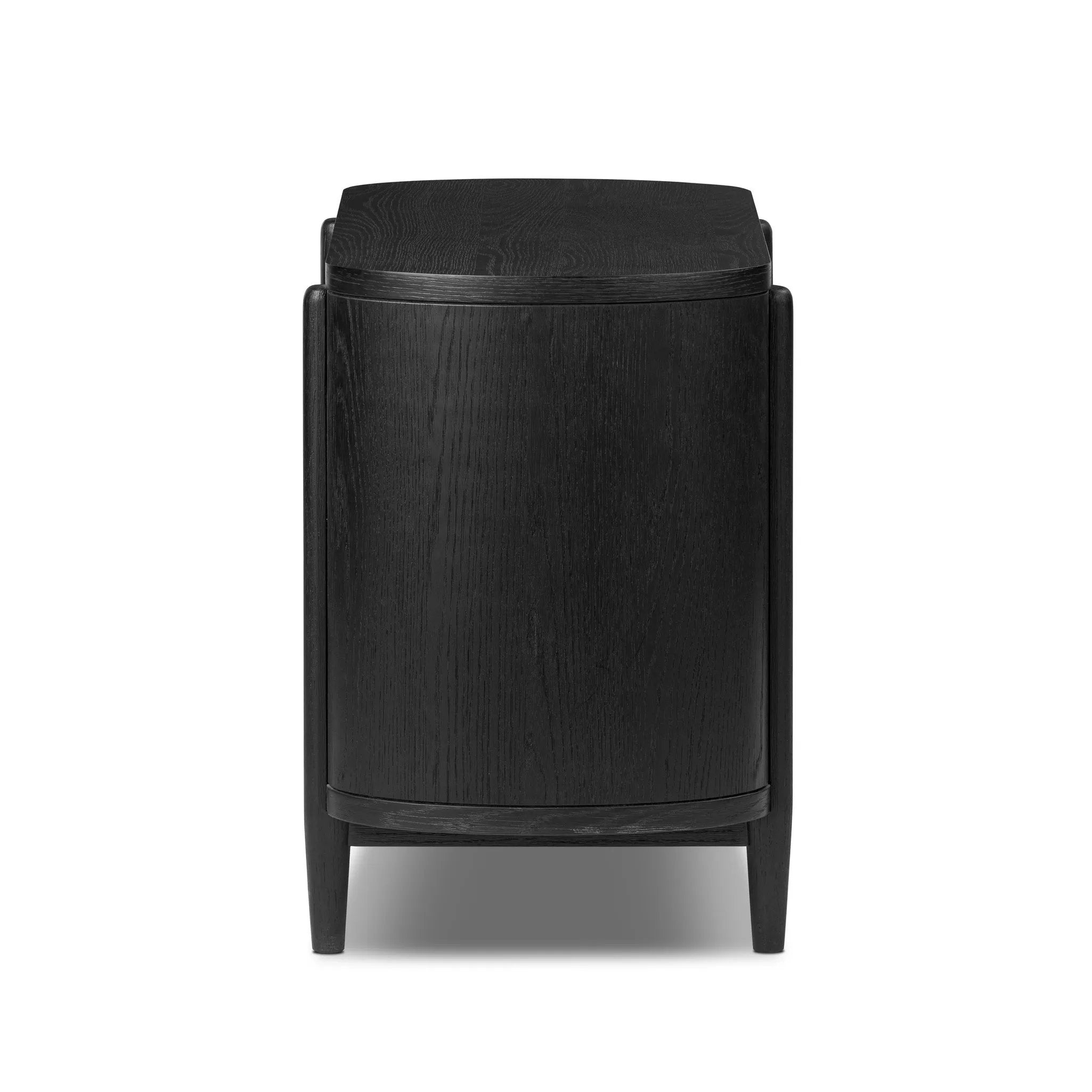 Infuse your collection with timeless midcentury design. Crafted from oak and parawood, a two-drawer nightstand is finished in a matte black, with simple brass hardware Amethyst Home provides interior design, new home construction design consulting, vintage area rugs, and lighting in the Houston metro area.