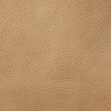 Great for smaller spaces or a reading nook, this petite slipper chair is wrapped in top-grain leather and backed with textured wood that folds into wings, cradling the head and shoulders for a little extra support. Features a 360-degree swivel base. Amethyst Home provides interior design, new home construction design consulting, vintage area rugs, and lighting in the Miami metro area.