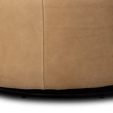 Great for smaller spaces or a reading nook, this petite slipper chair is wrapped in top-grain leather and backed with textured wood that folds into wings, cradling the head and shoulders for a little extra support. Features a 360-degree swivel base. Amethyst Home provides interior design, new home construction design consulting, vintage area rugs, and lighting in the Seattle metro area.