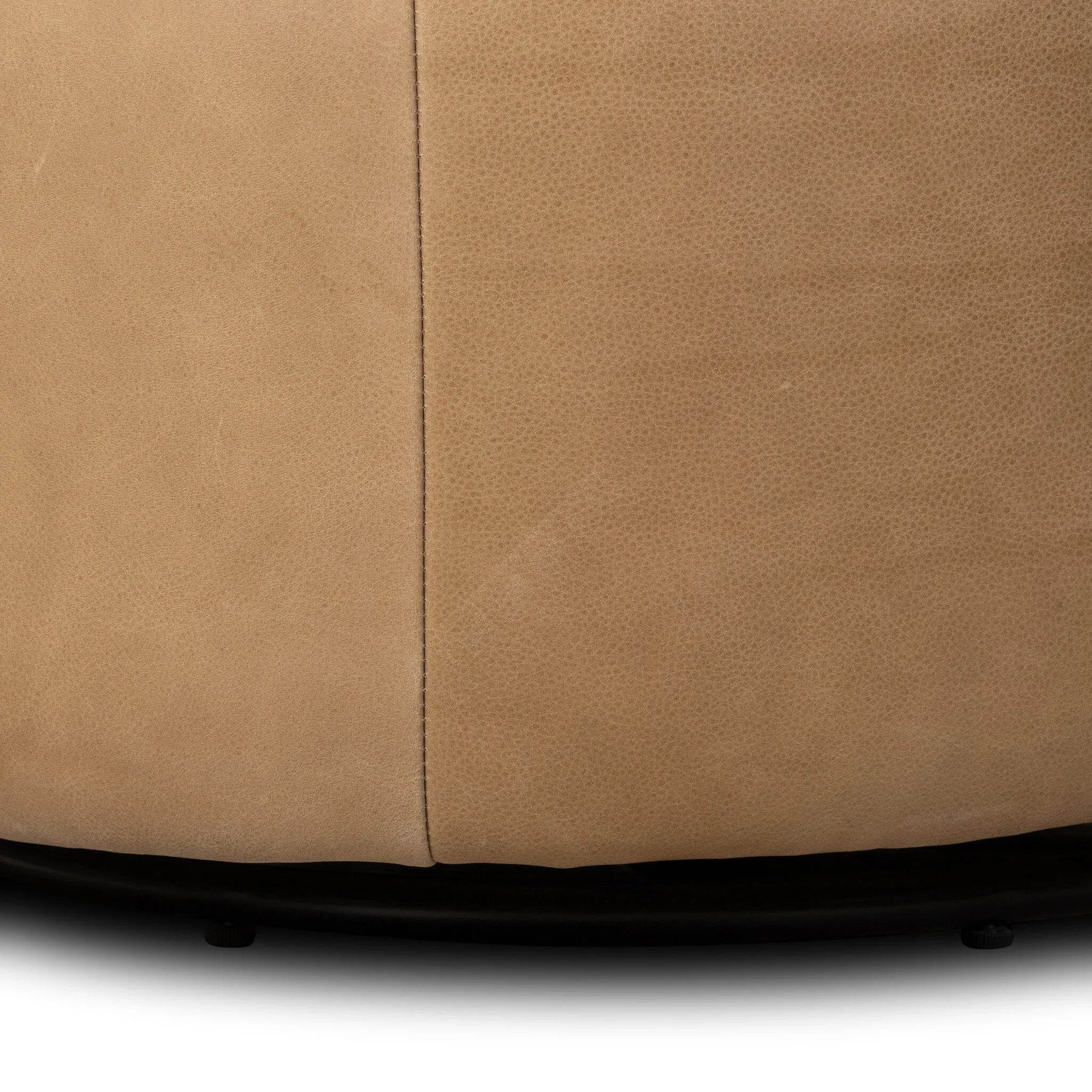 Great for smaller spaces or a reading nook, this petite slipper chair is wrapped in top-grain leather and backed with textured wood that folds into wings, cradling the head and shoulders for a little extra support. Features a 360-degree swivel base. Amethyst Home provides interior design, new home construction design consulting, vintage area rugs, and lighting in the Seattle metro area.