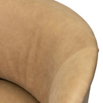 Great for smaller spaces or a reading nook, this petite slipper chair is wrapped in top-grain leather and backed with textured wood that folds into wings, cradling the head and shoulders for a little extra support. Features a 360-degree swivel base. Amethyst Home provides interior design, new home construction design consulting, vintage area rugs, and lighting in the Winter Garden metro area.