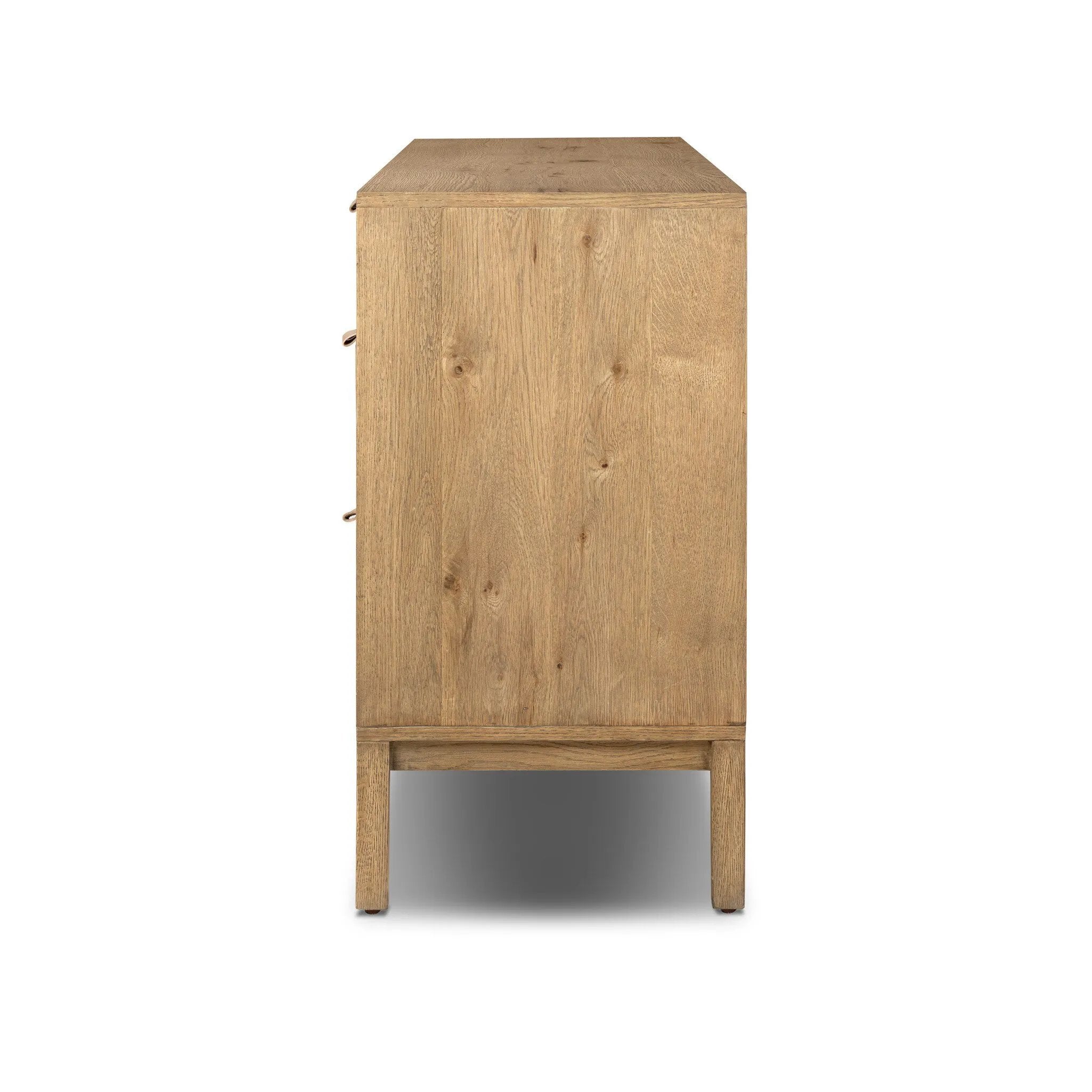 Modern Shaker style meets Scandinavian simplicity in this warm worn oak dresser. Seven spacious drawers with leather pulls provide plenty of room for clothing.As enthusiasts of organic modern materials at Amethyst, we love the warm modern inspired Tula 7 Drawer Dresser - Worn Oak Veneer. Amethyst Home provides interior design, new home construction design consulting, vintage area rugs, and lighting in the Calabasas metro area.