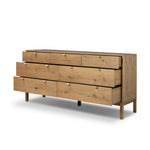Modern Shaker style meets Scandinavian simplicity in this warm worn oak dresser. Seven spacious drawers with leather pulls provide plenty of room for clothing.As enthusiasts of organic modern materials at Amethyst, we love the warm modern inspired Tula 7 Drawer Dresser - Worn Oak Veneer. Amethyst Home provides interior design, new home construction design consulting, vintage area rugs, and lighting in the Laguna Beach metro area.