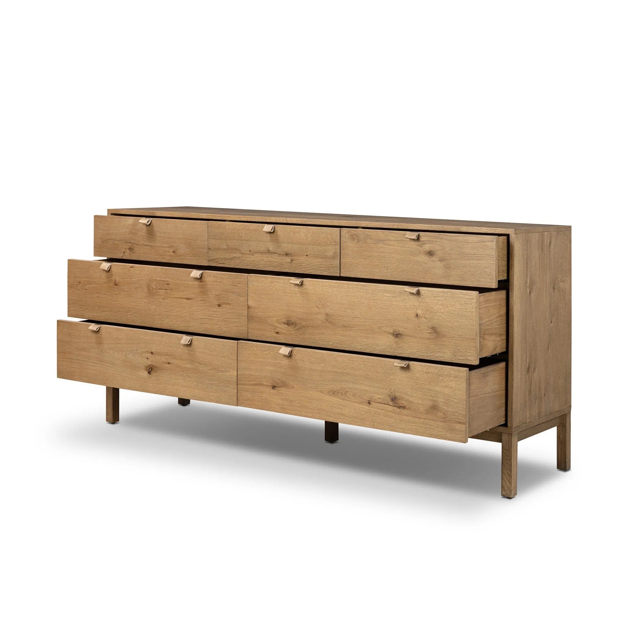 Modern Shaker style meets Scandinavian simplicity in this warm worn oak dresser. Seven spacious drawers with leather pulls provide plenty of room for clothing.As enthusiasts of organic modern materials at Amethyst, we love the warm modern inspired Tula 7 Drawer Dresser - Worn Oak Veneer. Amethyst Home provides interior design, new home construction design consulting, vintage area rugs, and lighting in the Laguna Beach metro area.