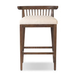 A low, linear counter stool inspired by Japanese tea houses, crafted from natural ash. Designed for comfort, a thick cushion seat is upholstered in a casual poly-linen blend Amethyst Home provides interior design, new home construction design consulting, vintage area rugs, and lighting in the Austin metro area.