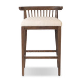 A low, linear counter stool inspired by Japanese tea houses, crafted from natural ash. Designed for comfort, a thick cushion seat is upholstered in a casual poly-linen blend Amethyst Home provides interior design, new home construction design consulting, vintage area rugs, and lighting in the Austin metro area.