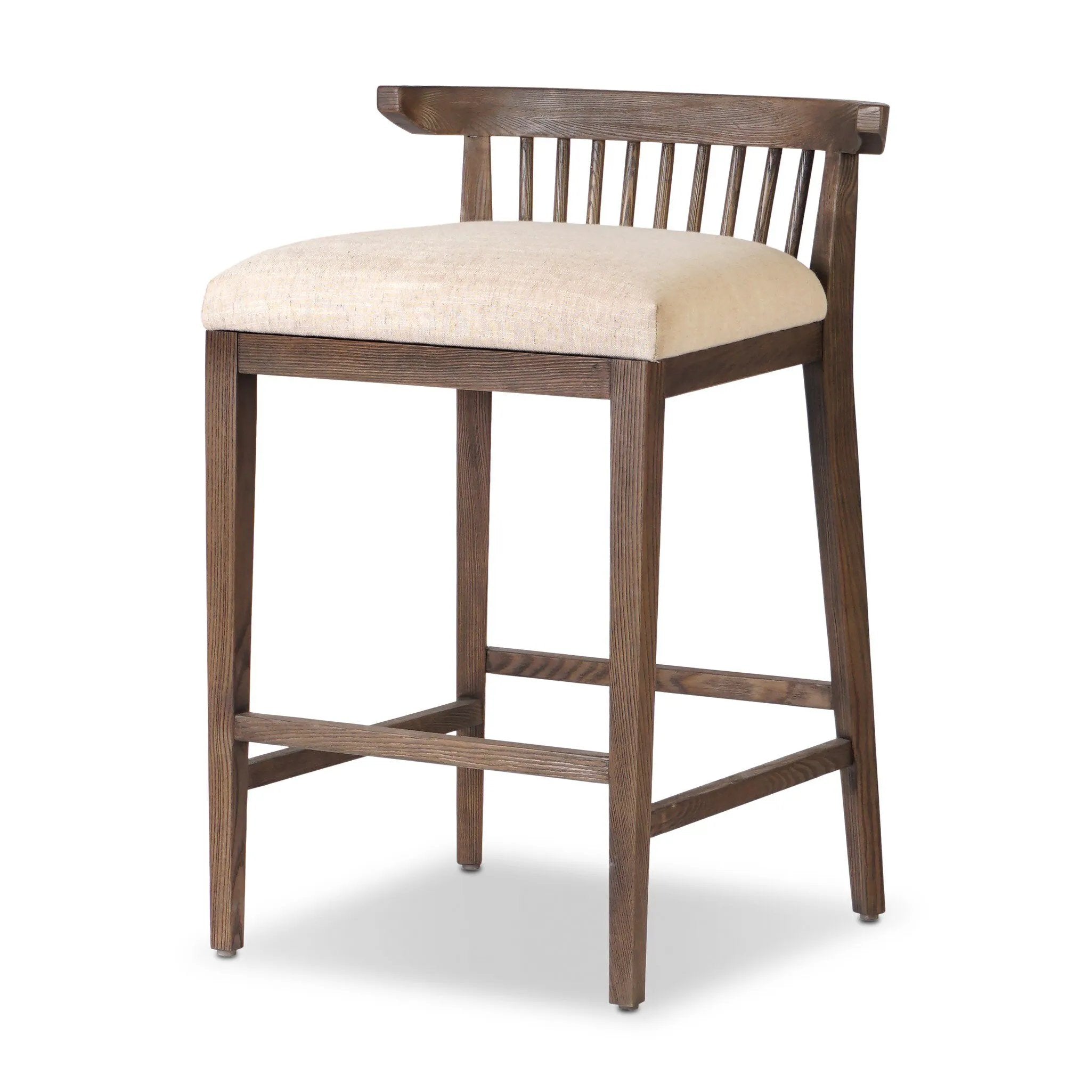A low, linear counter stool inspired by Japanese tea houses, crafted from natural ash. Designed for comfort, a thick cushion seat is upholstered in a casual poly-linen blend Amethyst Home provides interior design, new home construction design consulting, vintage area rugs, and lighting in the Dallas metro area.