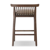 A low, linear counter stool inspired by Japanese tea houses, crafted from natural ash. Designed for comfort, a thick cushion seat is upholstered in a casual poly-linen blend Amethyst Home provides interior design, new home construction design consulting, vintage area rugs, and lighting in the Newport Beach metro area.