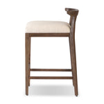 A low, linear counter stool inspired by Japanese tea houses, crafted from natural ash. Designed for comfort, a thick cushion seat is upholstered in a casual poly-linen blend Amethyst Home provides interior design, new home construction design consulting, vintage area rugs, and lighting in the Scottsdale metro area.