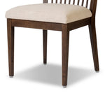 A linear dining style inspired by Japanese tea houses, crafted from natural ash. Designed for comfort, a thick cushion seat is upholstered in a casual poly-linen blend Amethyst Home provides interior design, new home construction design consulting, vintage area rugs, and lighting in the Washington metro area.
